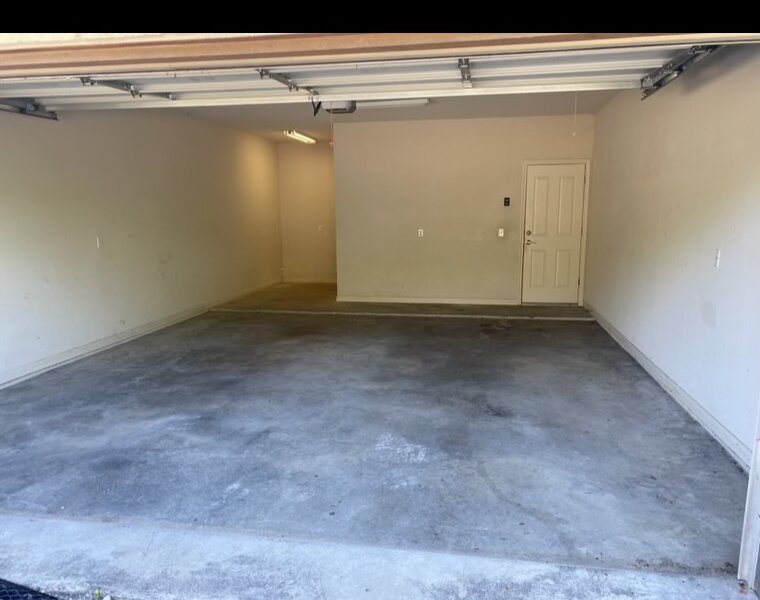 A garage cleared and swept clean